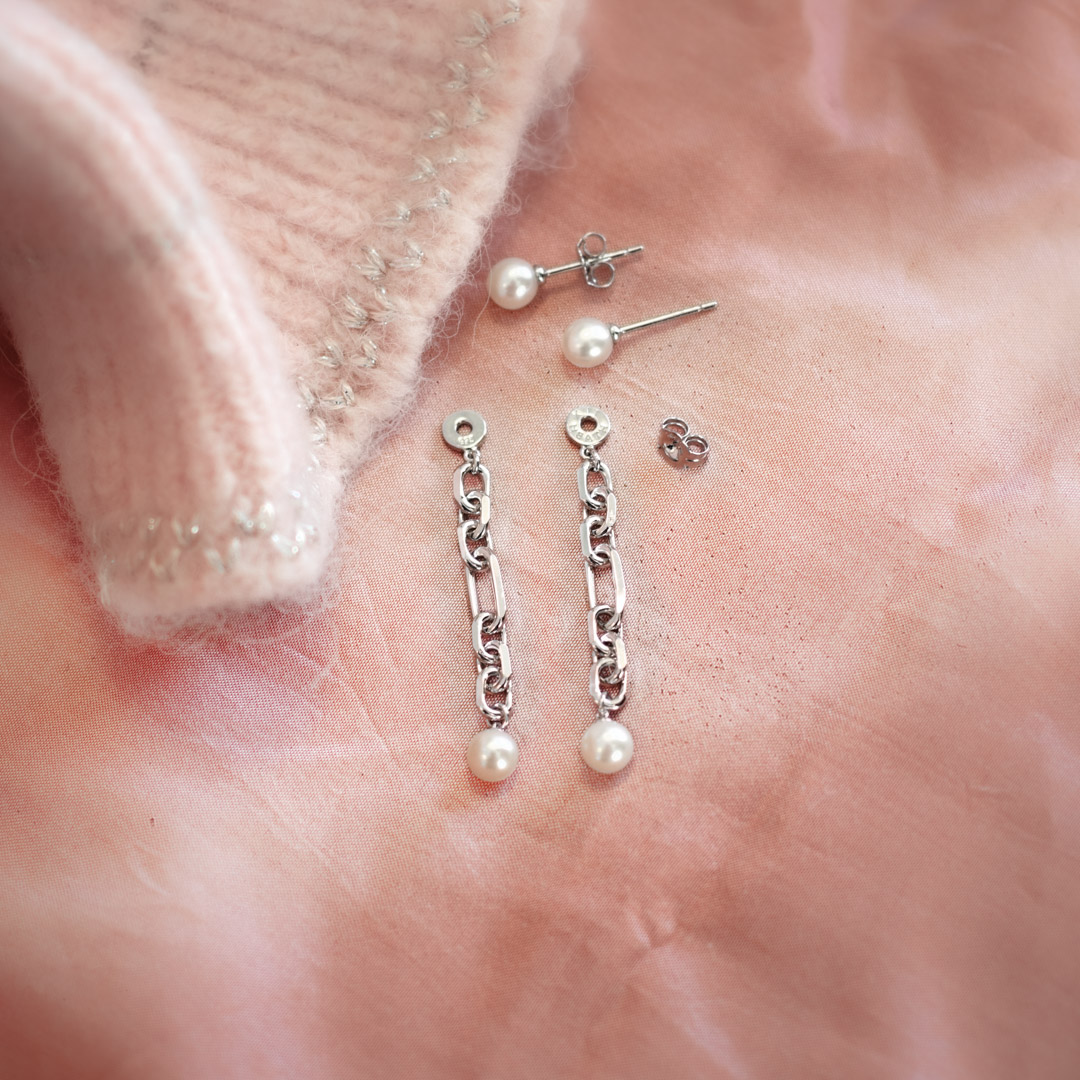 Astoria Figaro Pearl Chain Drop Earrings in stylised shot